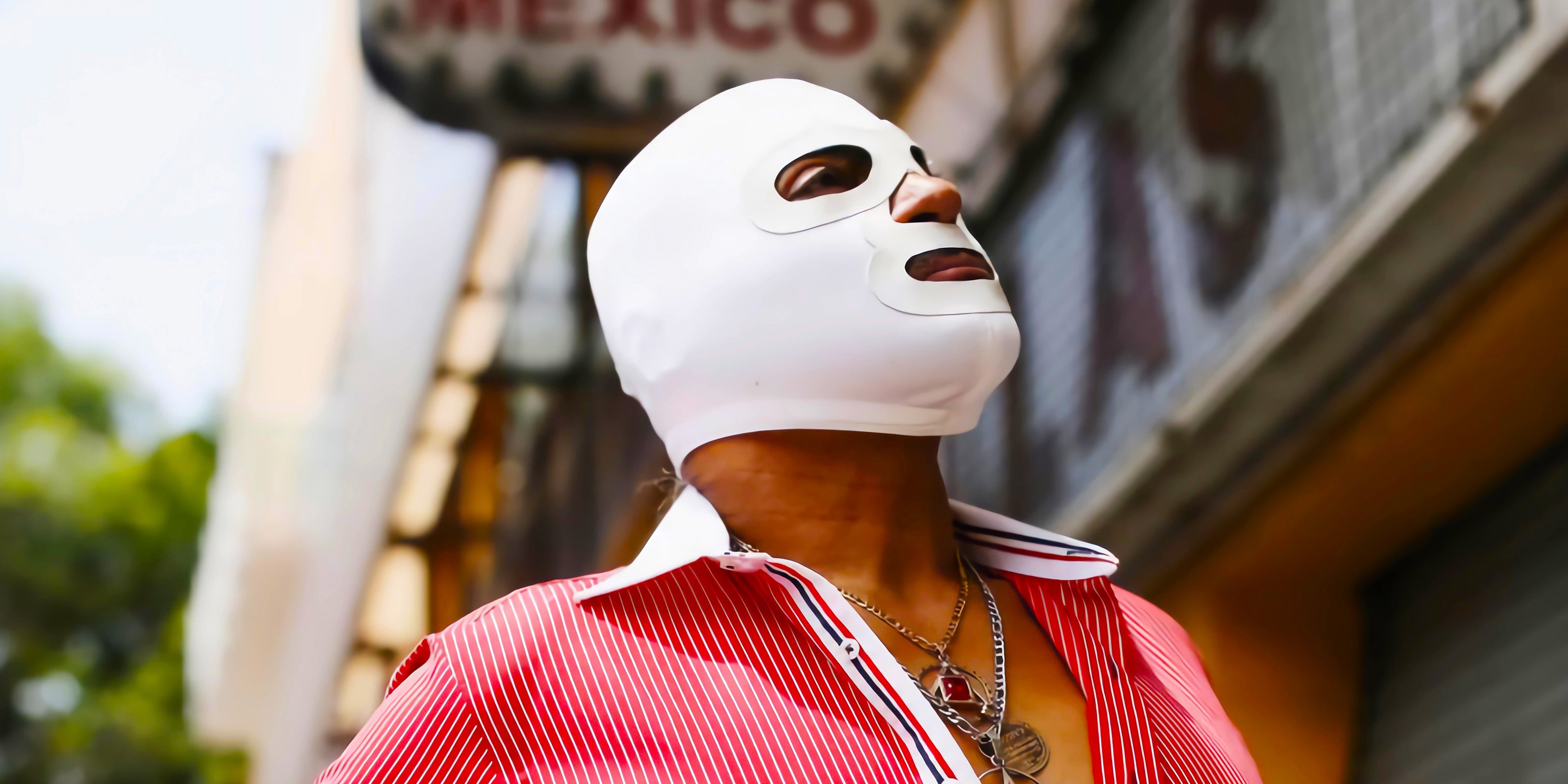 Luchador in White Mask Looking Up